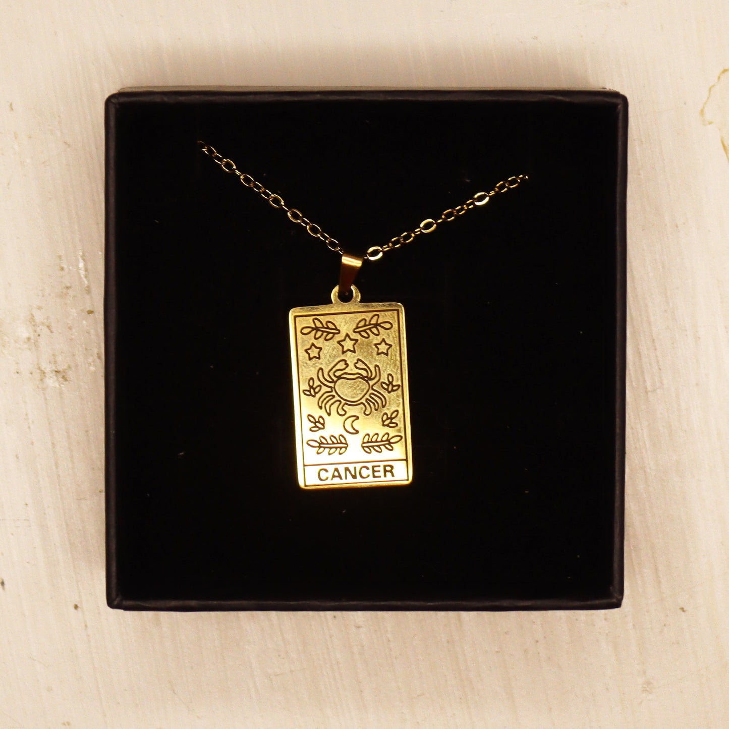 Cancer birthday gift necklace-pendant, Zodiac star-sign 18k gold-plated jewellery beautifully packaged in a black box.