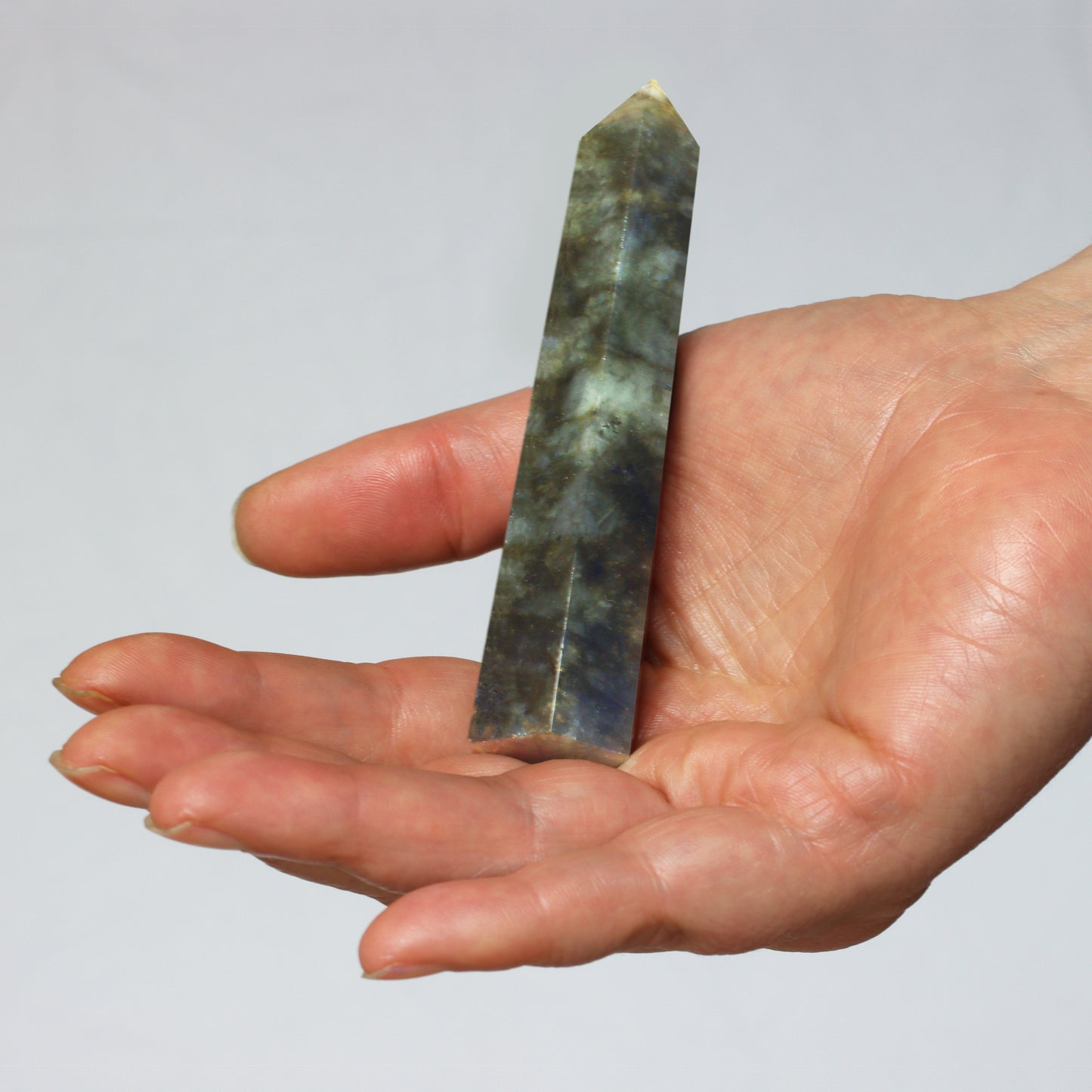 Dark green Labradorite stone Crystal Hexagonal Tower / Obelisk. Esoteric spiritual gifts from our New Age metaphysical store based in Melbourne Autralia. Dark green color.