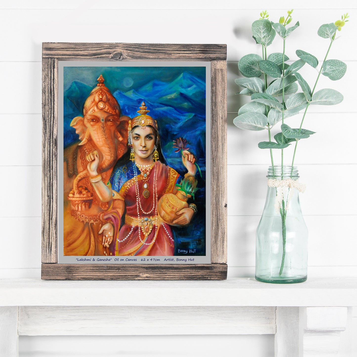 Lakshmi and Ganesh wall Art Print, Hindu mythology. Goddess of prosperity and beauty. Elephant God who is the remover of opstacles. Reproduced from an original oil painting. Framed print on fireplace.