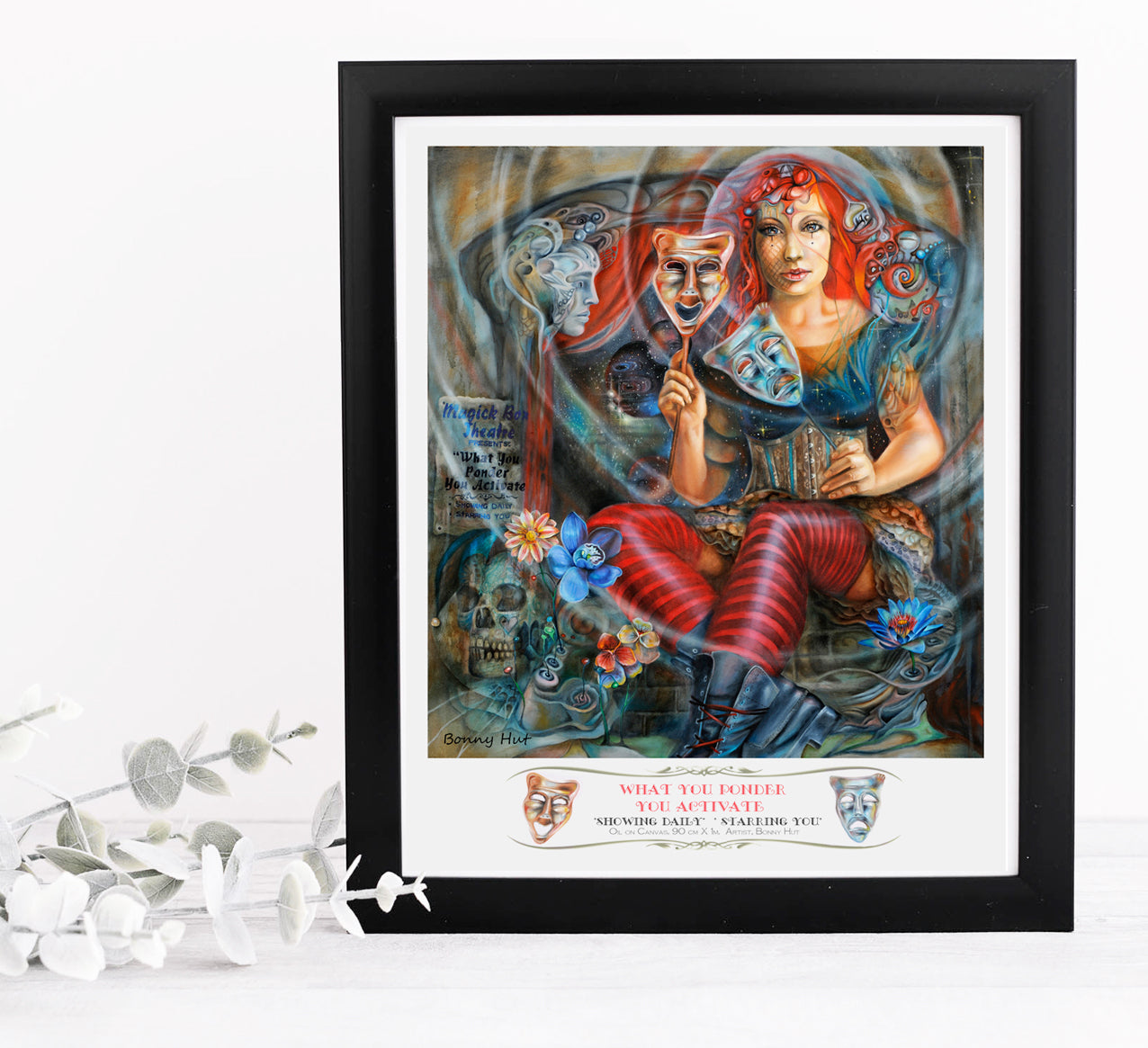Law of Attraction Esoteric wall art print in a black frame. Carnival Theatre Surreal Visionary art reproduced from an original oil painting. A woman in front of a stage holding comedy tragedy masks.
