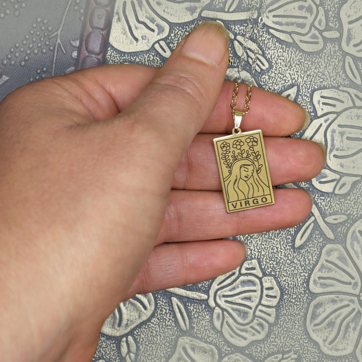 Virgo birthday gift necklace-pendant, Zodiac star-sign jewellery. Spiritual Esoteric gifts for her. Great for horoscope astrology lovers. Shown in hand.