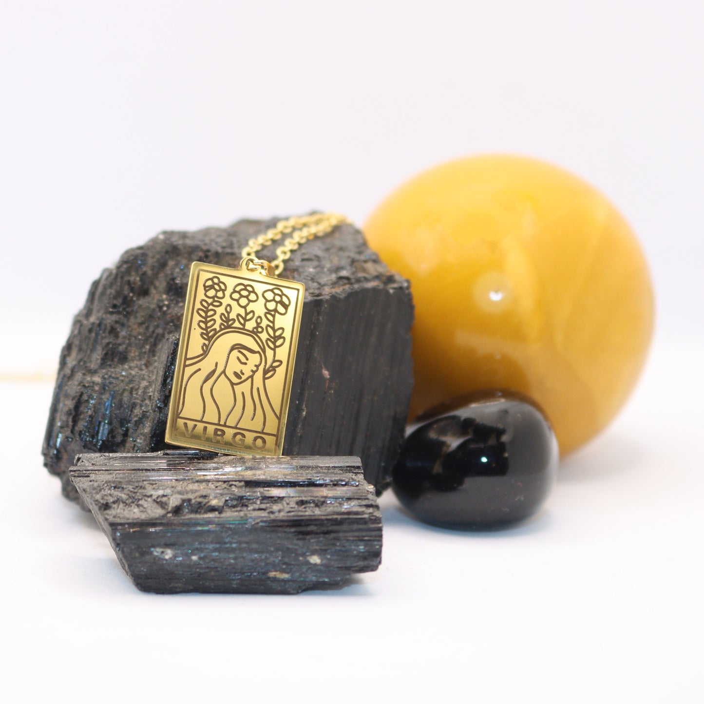 Virgo birthday gift necklace-pendant, Zodiac star-sign jewellery. Spiritual Esoteric gifts for her. Great for horoscope astrology lovers. Displayed with rocks and crystals.