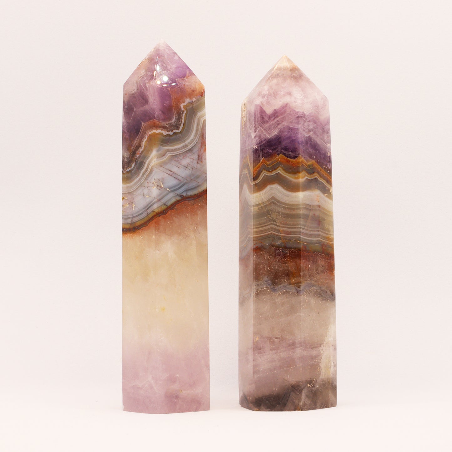 Beautiful layered Amethyst Quartz Crystal Hexagonal Towers Obelisks Wands. Esoteric decor,spiritual gifts from our online new age metaphysical store based in Melbourne Australia.