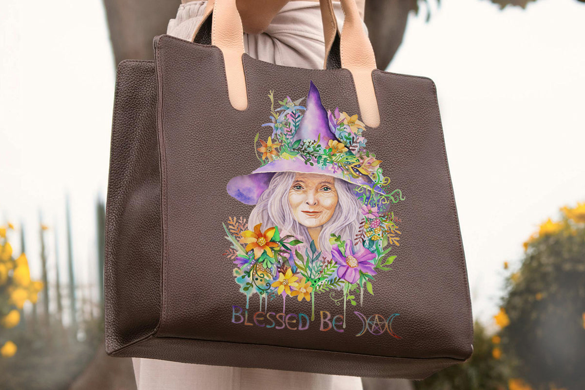 Brown tote bag with a colorful design of a witch wearing a witches hat and flowers, with 'Blessed Be' text.

Downloadable, printable clip art reproduced from a hand-painted wiccan / pagan watercolor painting. An instant-access digital product.