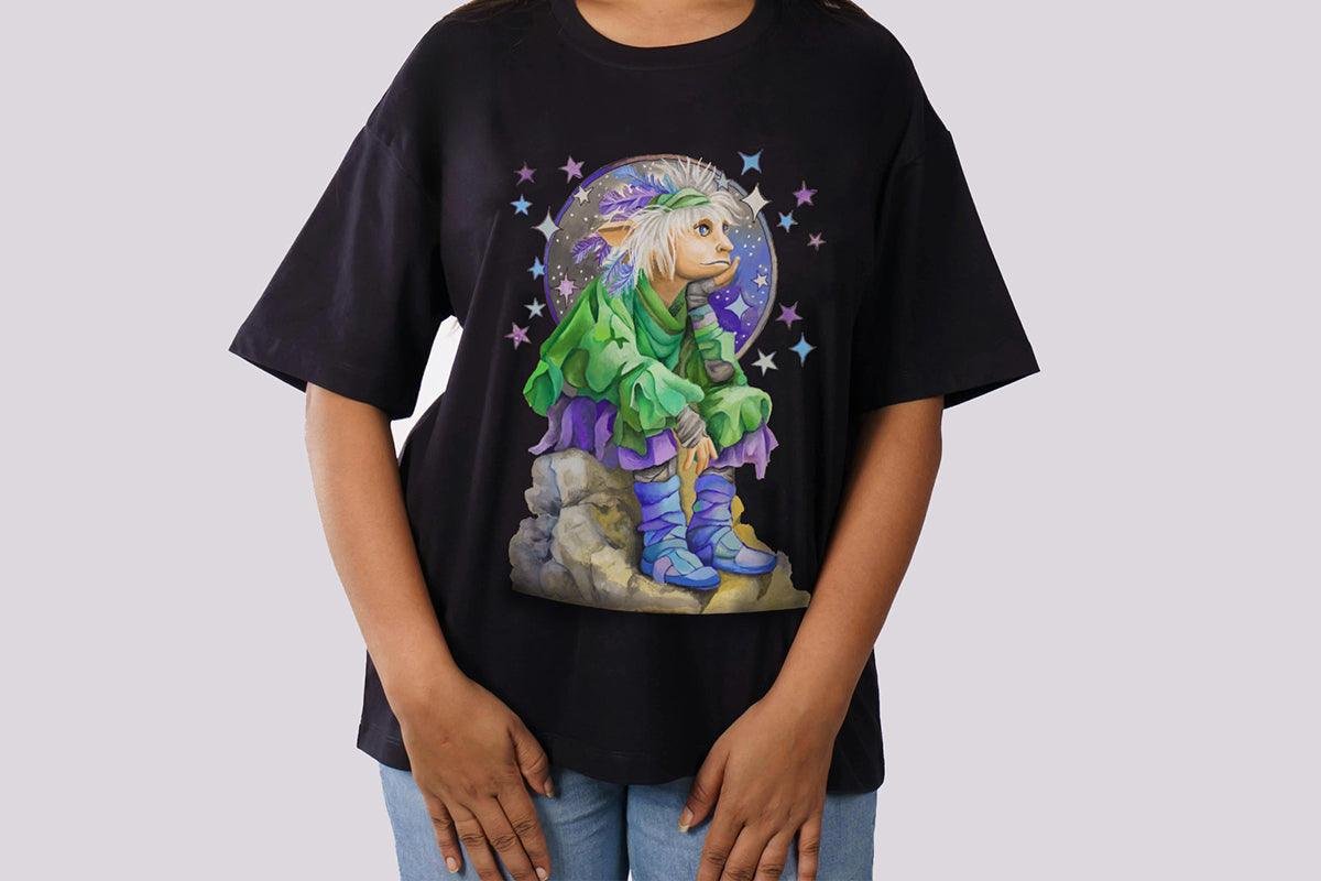 Person wearing a black t-shirt with a colorful graphic design of a spiritual pixie shaman character with animal features on a plain background.

Downloadable, printable wall art reproduced from a hand-painted  gouache painting. Instant access digital product.
