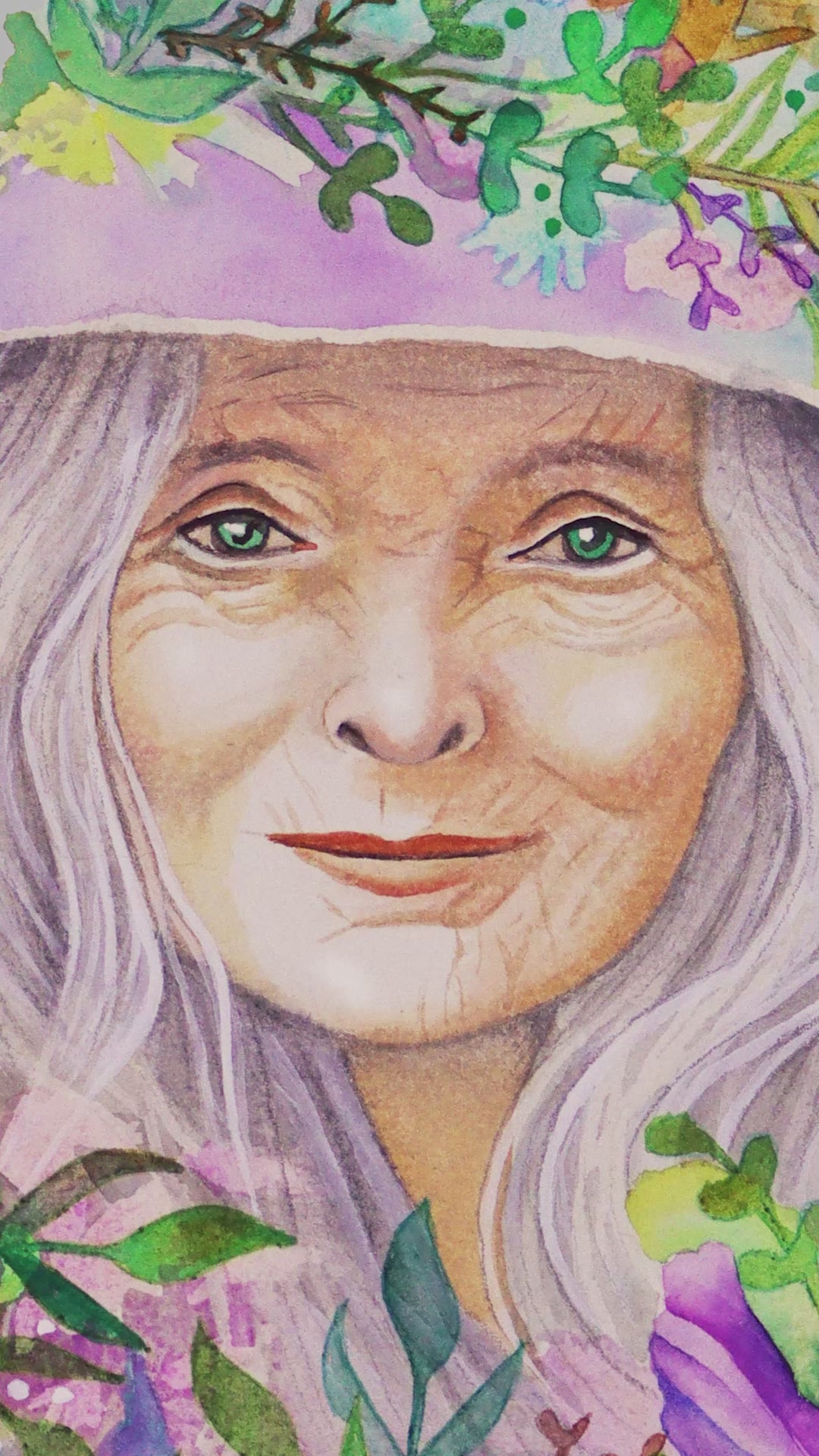Time-lapse video of a watercolor painting of a crone witch surrounded by flowers. T